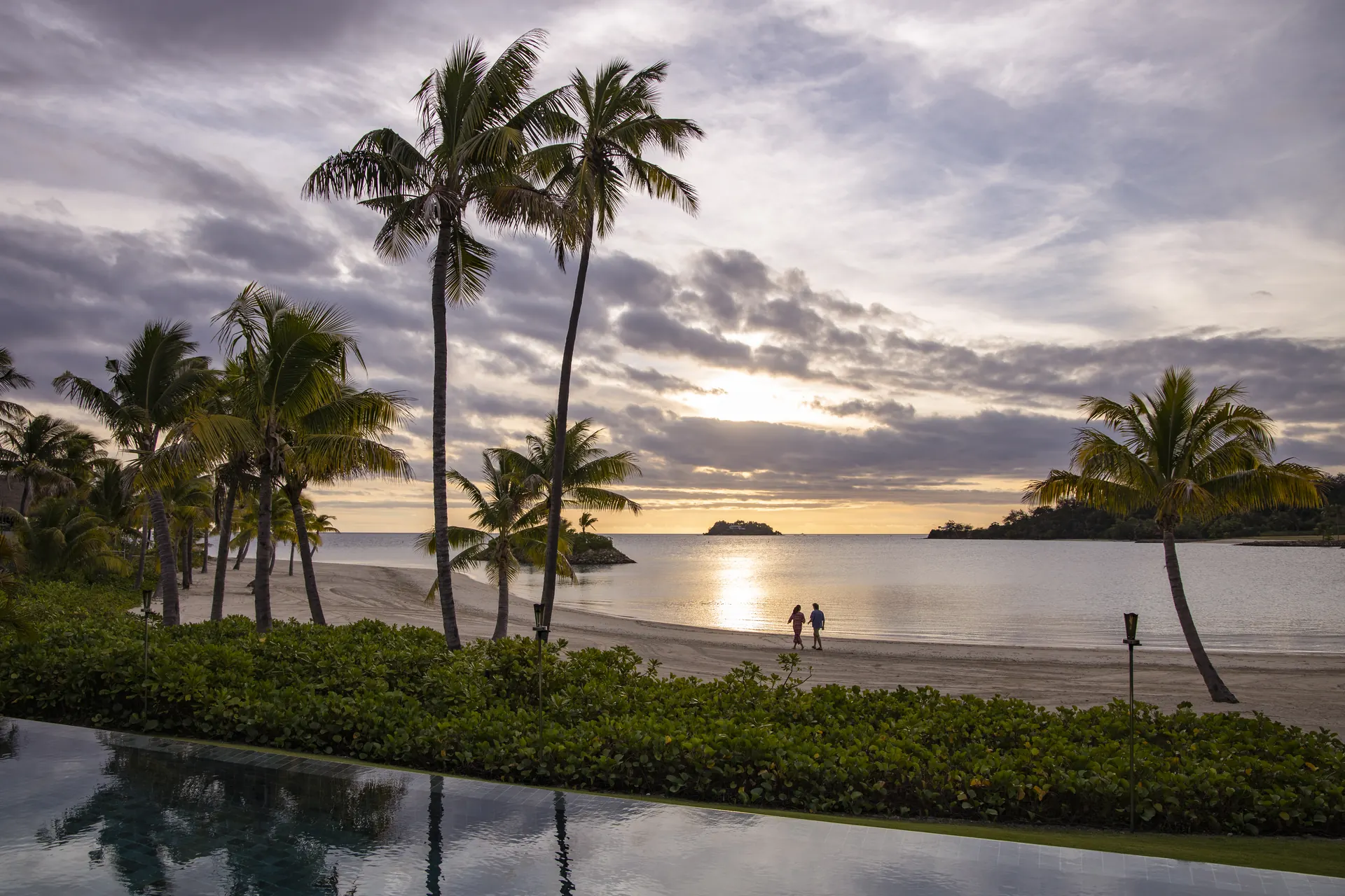 Sunset view from a private residence pool at Six Senses Fiji