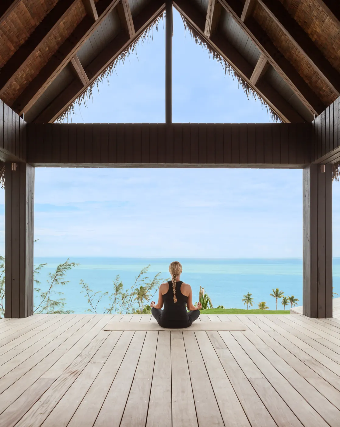 Yoga overlooking the ocean at Six Senses Fiji